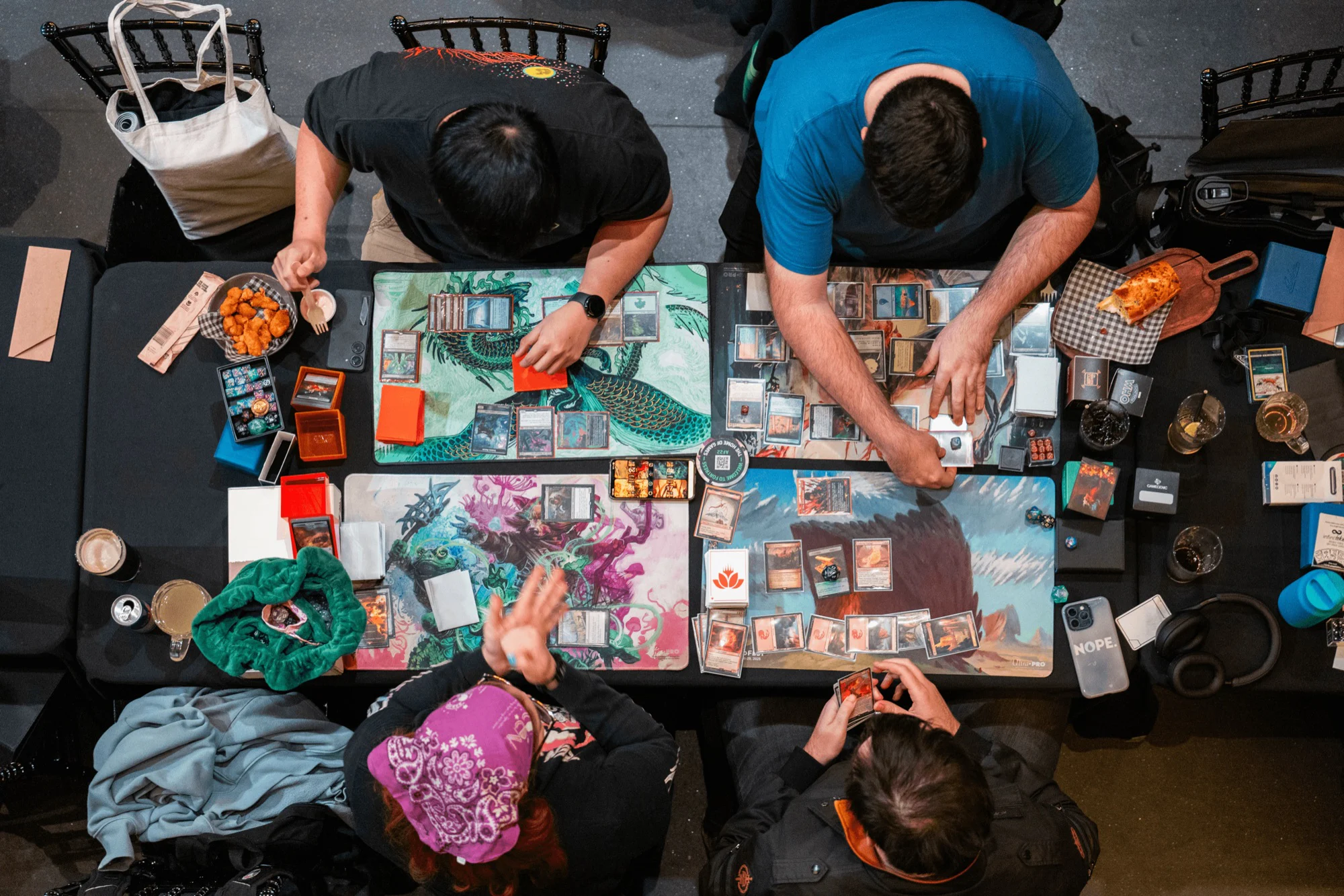 Players seated for a Mana on Tap fixture at Fortress