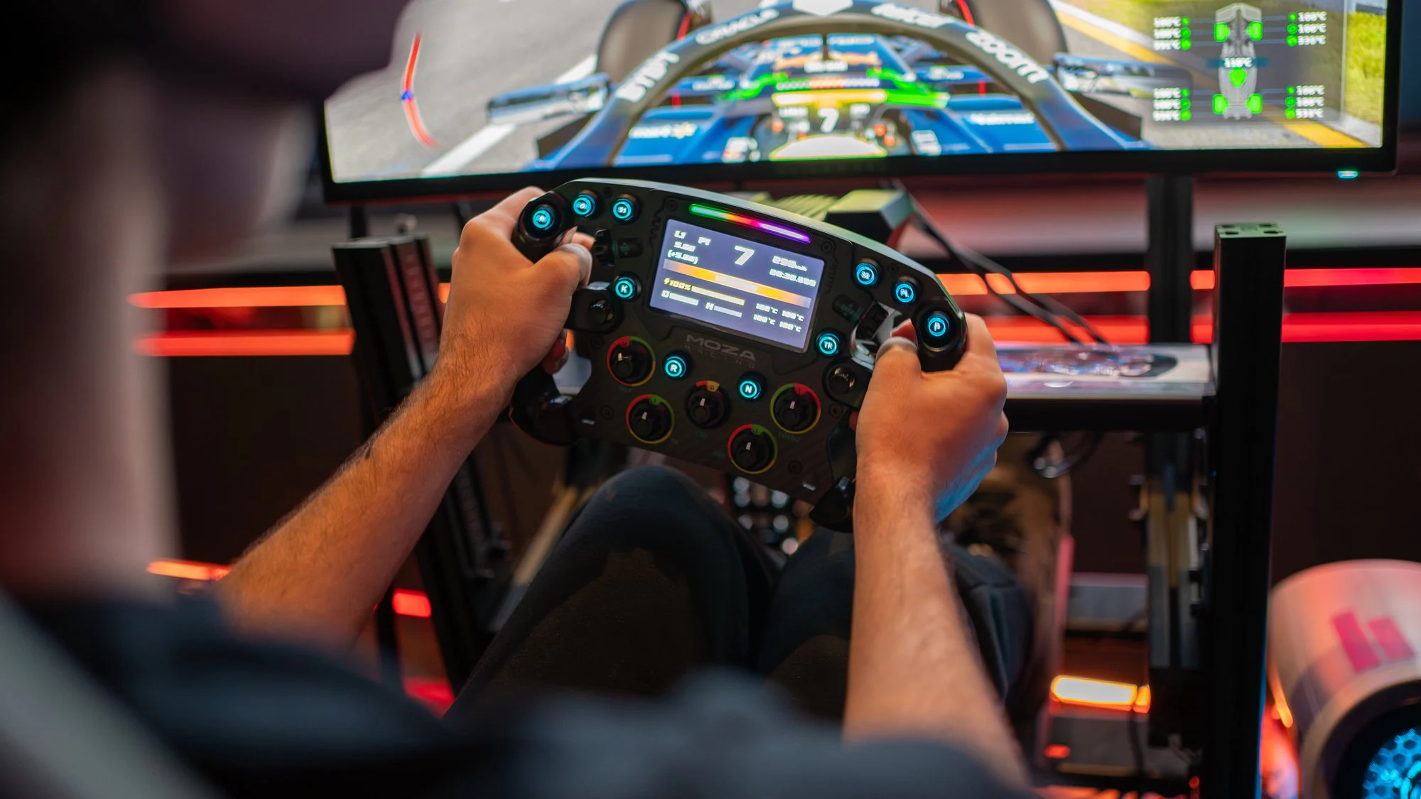 Close-up of a driver's hands on the wheel